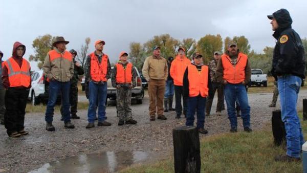 Adam Grove, Canyon Ferry Wildlife Management Area manager speaks to youth participating in the Headwaters 2014 fall youth hunt