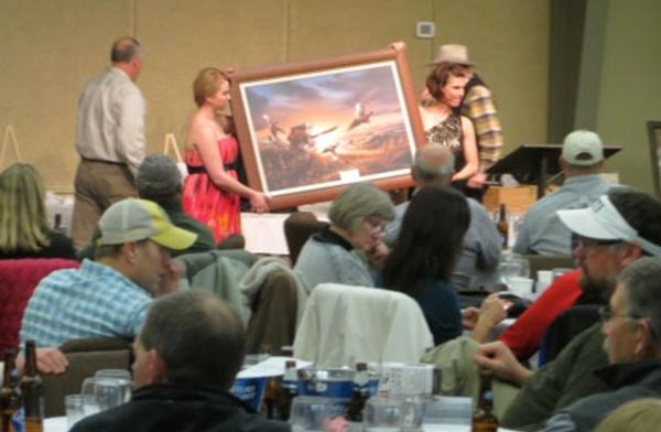 A PF print is sold at the 2013 PF Banquet in Helena